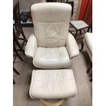 EKORNES CREAM LEATHER SWIVEL ARMCHAIR AND MATCHING FOOT STOOL