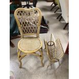 A VINTAGE CANE AND BAMBOO CHAIR WITH A CANE AND BAMBOO MAGAZINE RACK