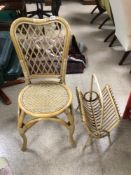 A VINTAGE CANE AND BAMBOO CHAIR WITH A CANE AND BAMBOO MAGAZINE RACK