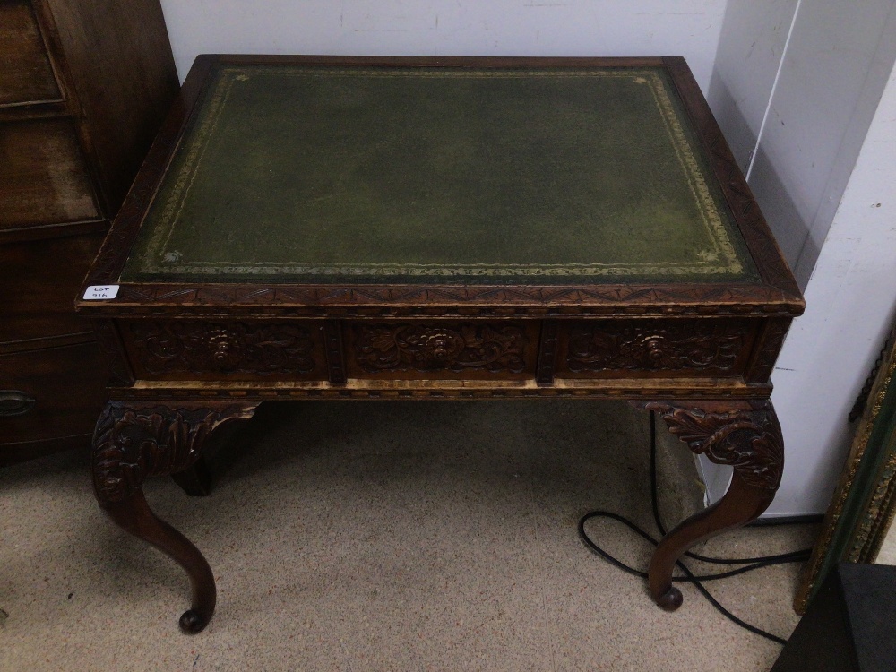 HEAVY CARVED OAK WRITING DESK WITH GREEN LEATHER TOP WITH THREE DRAWERS