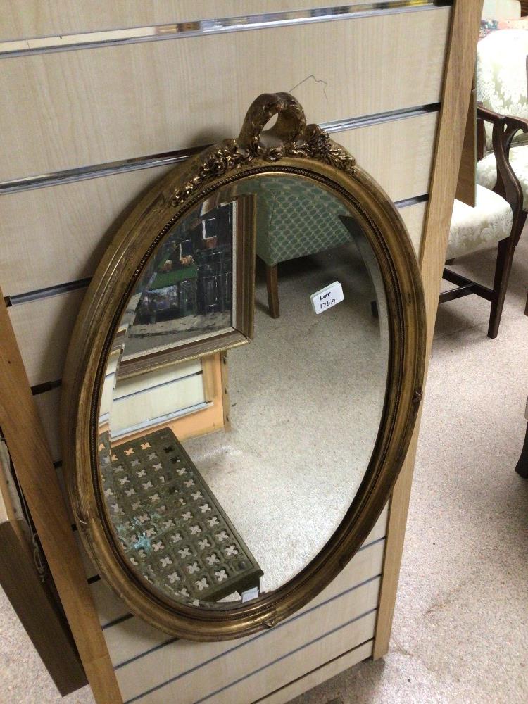 VINTAGE BEVELLED MIRROR OVAL SHAPED AND GILDED, 46 X78CM