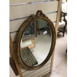 VINTAGE BEVELLED MIRROR OVAL SHAPED AND GILDED, 46 X78CM