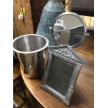 A VINTAGE CHROME CHAMPAGNE BUCKET WITH A SWING MIRROR AND A METAL PHOTO FRAME