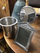 A VINTAGE CHROME CHAMPAGNE BUCKET WITH A SWING MIRROR AND A METAL PHOTO FRAME