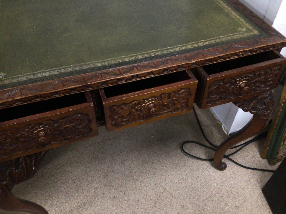 HEAVY CARVED OAK WRITING DESK WITH GREEN LEATHER TOP WITH THREE DRAWERS - Image 4 of 6