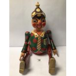 A VINTAGE WOODEN PINOCCHIO FIGURE WITH REMOVABLE ARMS AND LEGS