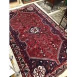 A VINTAGE PERSIAN RUG, 272 X 182CM