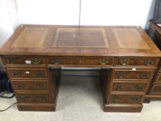 VINTAGE BURR WALNUT WRITING DESK WITH BROWN LEATHER TOP AND NINE DRAWERS