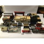 COLLECTION OF TRAIN-RELATED ITEMS, (HORNBY, TRIANG, AND MORE), INCLUDING BUILDINGS, ACCESSORIES, AND