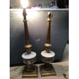 A PAIR OF COLUMN LAMPS GILDED WITH CERAMIC (RESERVOIRS), 62CM