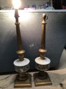 A PAIR OF COLUMN LAMPS GILDED WITH CERAMIC (RESERVOIRS), 62CM