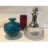 TWO ART GLASS VASES AND A PLATED DECANTER WITH STOPPER, ONE VASE STAMPED MDINA. LARGEST BEING 23CM