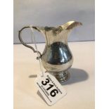 HEAVY HALLMARKED SILVER BALUSTER SHAPED CREAM JUG-GARRARD & CO LONDON 1977, 9CM, 151G