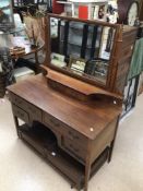 EDWARDIAN INLAID DRESSING TABLE WITH BEVELLED MIRROR AND SIX DRAWERS ON CASTORS