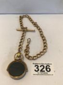 YELLOW METAL GENTS WATCH CHAIN WITH GOLD SPINNING FOB STAMPED 10CT, 54G GROSS