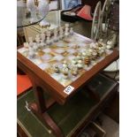 WOODEN CHESS TABLE WITH CHESS PIECES IN ONYX