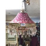 CHANDELIER, CRANBERRY CUT GLASS WITH BRASS AND GLASS DROPLETS