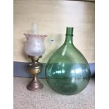 ANTIQUE CARBOY WITH A DUPLEX OIL LAMP