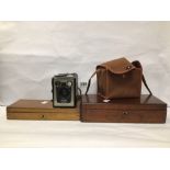 TWO VINTAGE MAHOGANY BOXES WITH A KODAK BROWNIE MODEL E