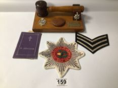 GAVEL AND STAND WITH MILITARY BADGES AND MORE