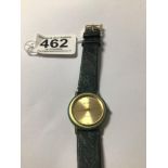 GUCCI QUARTZ WATCH ON A GREEN LEATHER STRAP (NEW BATTERY NEEDED)