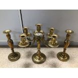 BRASS CANDELABRA WITH A PAIR OF BRASS CANDLESTICKS