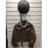 CHESHIRE REGIMENT MILITARY 1944 ARMY BATTLEDRESS JACKET WITH A MILITARY HELMET