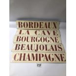 FIVE FRENCH METAL WALL SIGNS. CHAMPAGNE, BEAUJOLAIS, BOURGOGNE, LA CAVE AND BORDEAUX. ALL BEING 40CM