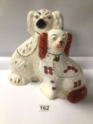 TWO VINTAGE STAFFORDSHIRE DOGS, THE LARGEST 25CM