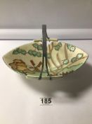 CROWN DEVON POTTERY FIELDING’S (M201) TWIN-HANDLED DISH WITH A WHITE METAL HANDLE. BEING 19CM X 26CM