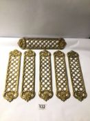 SIX DECORATIVE BRASS FINGERPLATES, 29CM