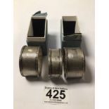 PAIR OF HALLMARKED SILVER ENGINE TURNED NAPKIN RINGS, 53 GRAMS & ONE OTHER
