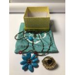KENDRA SCOTT TIGERS EYE RING WITH A BUTLER AND WILSON FLOWER NECKLACE