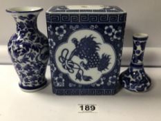 THREE BLUE AND WHITE CHINESE PORCELAIN VASES WITH FLORAL DECORATIONS AND ONE WITH CHARACTER MARKS TO