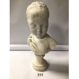 A CHALK WARE BUST OF A YOUNG CHILD. BEING 33CM IN HEIGHT.