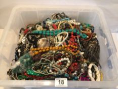 LARGE COLLECTION OF COSTUME JEWELLERY. INCLUDES BANGLES, NECKLACES, BRACELETS, AND MORE
