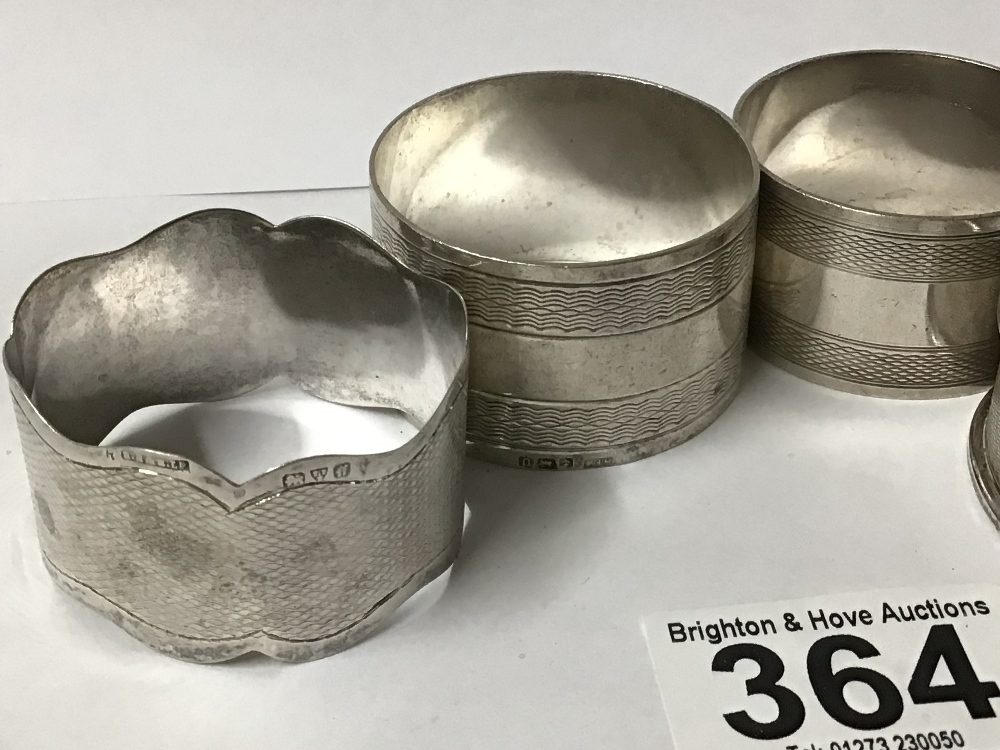 FOUR HALLMARKED SILVER ENGINE TURNED NAPKIN RINGS, 88 GRAMS - Image 3 of 3