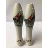 TWO WHITE PORCELAIN BEER PUMP PULL HANDLES, WITH HUNTING SCENE DESIGN.