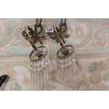 TWO BRASS WALL LIGHTS WITH CRYSTAL GLASS DROPS