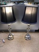 PAIR OF SILVER COLOURED RESIN AND GLASS MODERN TABLE LAMPS