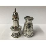 HALLMARKED SILVER OCTAGONAL BALUSTER PEPPER, 8CM WITH A HALLMARKED SILVER FOLIATE ENGRAVED PEPPER,