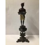 BRONZE BLACKMOOR FIGURE ON A PEWTER STAND, 40CM