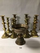 EASTERN BRONZE CIRCULAR PEDESTAL STAND 17CM, WITH FOUR PAIRS OF BRASS BALUSTER CANDLESTICKS