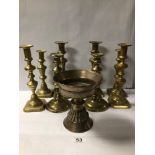 EASTERN BRONZE CIRCULAR PEDESTAL STAND 17CM, WITH FOUR PAIRS OF BRASS BALUSTER CANDLESTICKS