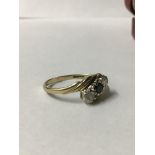 375 GOLD RING WITH STONES 1.5 GRAMS SIZE K