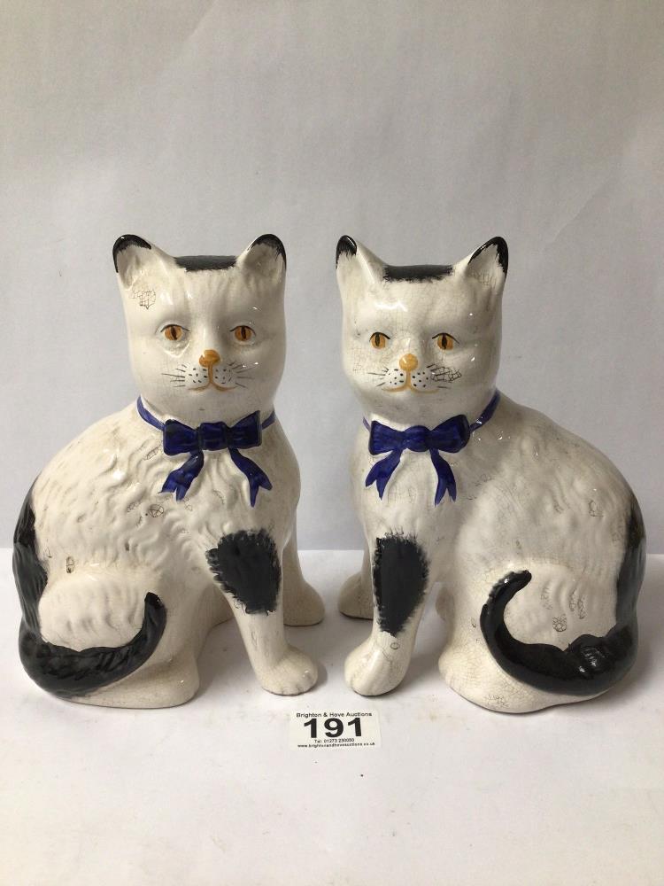 TWO PORCELAIN CAT FIGURES. ONE WITH MARKING TO BASE. 21CM IN HEIGHT