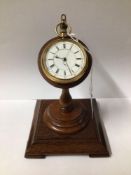 18K GOLD OPEN FACED POCKET WATCH ON A MAHOGANY STAND