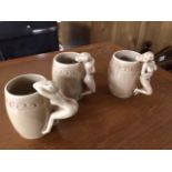 THREE SMALL NUDE HANDLE MUGS BY DOROTHY KINDELL 1940'S, 8CM