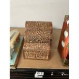 THREE NESTED CARVED WOOD TREES OF LIFE DOMED STORAGE CHESTS. LARGEST 23CM X 16CM X 16CM.