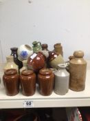 LARGE QUANTITY OF SMALL STONEWARE BOTTLES, EARLY DOULTON, AND MORE